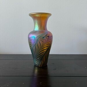 Robert held unsigned vase
